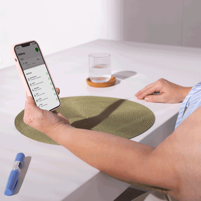 Phone screen showing medication log history