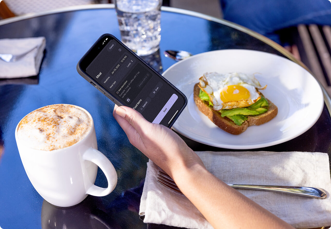 Person eating lunch and logging it in the Stelo app